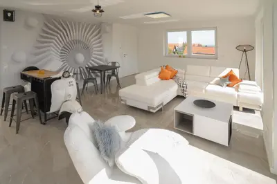 Ein Sitzbereich in der Unterkunft Designapartments Die besondere ART - Sennhütte 7