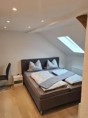 Ein Bett oder Betten in einem Zimmer der Unterkunft Ferienwohnung Ohanna Goslar