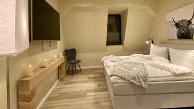 Ein Bett oder Betten in einem Zimmer der Unterkunft wohlBfinden appartementhaus