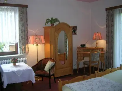 Ein Bett oder Betten in einem Zimmer der Unterkunft Südharz-Pension