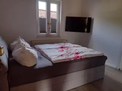 Ein Bett oder Betten in einem Zimmer der Unterkunft Insel