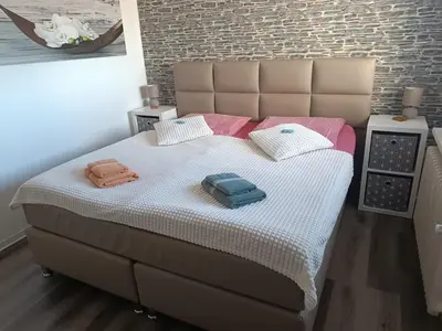 Ein Bett oder Betten in einem Zimmer der Unterkunft Ferienwohnung Harz Valley -Mit Fernblick in den Harz.