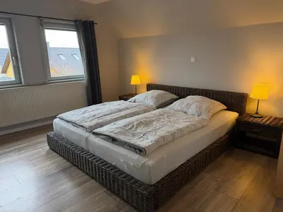 Ein Bett oder Betten in einem Zimmer der Unterkunft Harzhaus Ida