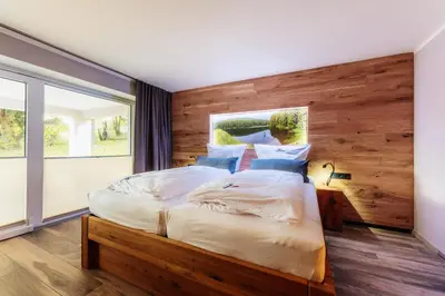 Ein Bett oder Betten in einem Zimmer der Unterkunft Baude VI