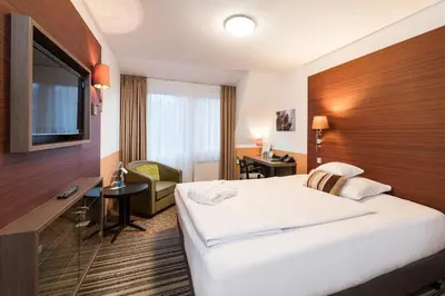 Ein Bett oder Betten in einem Zimmer der Unterkunft Göbel´s Vital Hotel Bad Sachsa