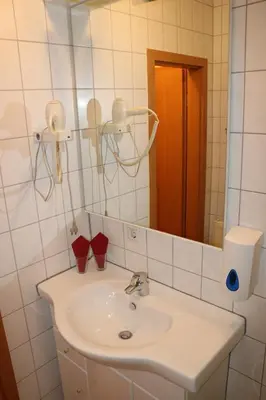 Ein Badezimmer in der Unterkunft Waldhotel Harz Ilsenburg