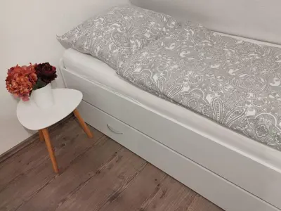 Ein Bett oder Betten in einem Zimmer der Unterkunft Ferienwohnung Knebel