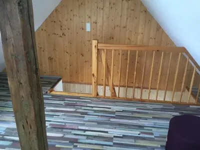 Ein Bett oder Betten in einem Zimmer der Unterkunft Atelier Wolkenschloss