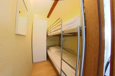 Ein Bett oder Betten in einem Zimmer der Unterkunft Apartment 466