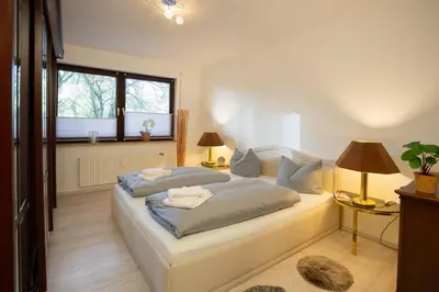 Ein Bett oder Betten in einem Zimmer der Unterkunft Bismarckstraße 27