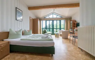 Ein Bett oder Betten in einem Zimmer der Unterkunft Appartement-Hotel-Anlage Tannenpark