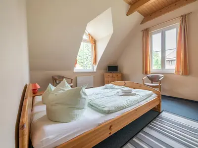 Ein Bett oder Betten in einem Zimmer der Unterkunft Appartement-Hotel-Anlage Tannenpark