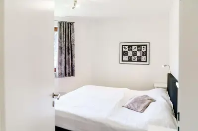 Ein Bett oder Betten in einem Zimmer der Unterkunft Bocksbergblick Fewo BB 02