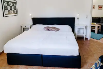 Ein Bett oder Betten in einem Zimmer der Unterkunft Bocksbergblick Fewo BB 02