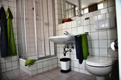 Ein Badezimmer in der Unterkunft Hotel Zum Schloss