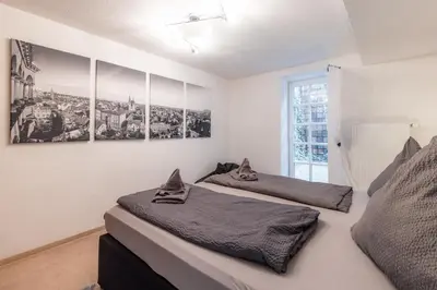 Ein Bett oder Betten in einem Zimmer der Unterkunft Ferienwohnung zum rost'gen Potte I