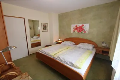 Ein Bett oder Betten in einem Zimmer der Unterkunft Ferienwohnung Friedrich