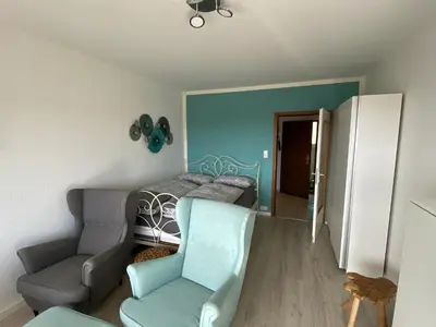 Ein Sitzbereich in der Unterkunft Apartment Harzblick -NEU MODERNISIERT-