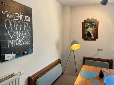Ein Sitzbereich in der Unterkunft Vor lauter Bäumen B&B