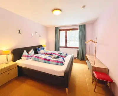 Ein Bett oder Betten in einem Zimmer der Unterkunft Vor lauter Bäumen B&B