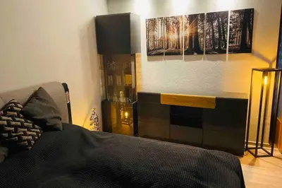 Ein Bett oder Betten in einem Zimmer der Unterkunft Schönes ruhiges App mit Panoramablick auf den Harz