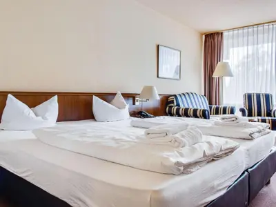 Ein Bett oder Betten in einem Zimmer der Unterkunft Wohnung am Seeufer in Hahnenkle