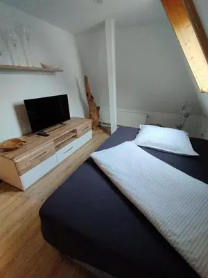 Ein Bett oder Betten in einem Zimmer der Unterkunft Ferienwohnung Lehmann - Wernigerode
