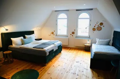 Ein Bett oder Betten in einem Zimmer der Unterkunft FeWo26 im Sagenharz - stilvolles Family-Apartment, 2 SZ, Klimaanlage, WLAN, Netflix & Free Parking