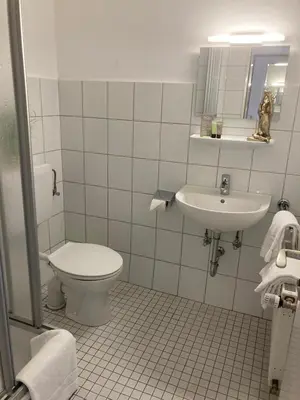 Ein Badezimmer in der Unterkunft Hostel Harzer Hof