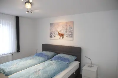 Ein Bett oder Betten in einem Zimmer der Unterkunft Wohnung Julius 2