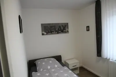 Ein Bett oder Betten in einem Zimmer der Unterkunft Wohnung Julius 3