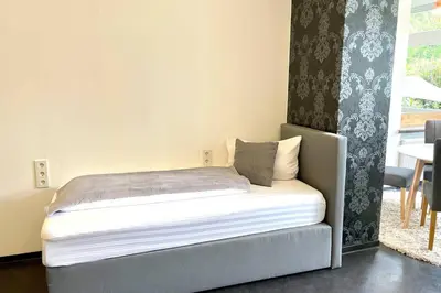 Ein Bett oder Betten in einem Zimmer der Unterkunft Villa Einhorn: Altstadt Loft mit privater Terrasse