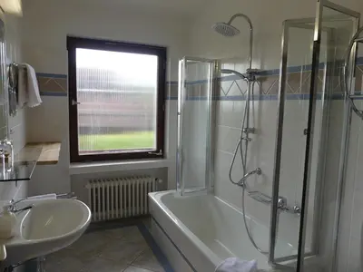 Ein Badezimmer in der Unterkunft Harmonie Hotel Rust