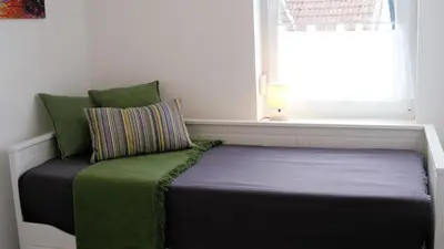 Ein Bett oder Betten in einem Zimmer der Unterkunft FeWo Rübezahl mit Kamin #Innenstadtnähe#Netflix von Harztraveler