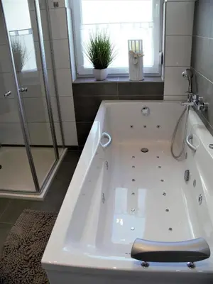 Ein Badezimmer in der Unterkunft FeWo Sonnenschein mit Whirlpoolbadewanne #Innestadtnähe#Netflix von Harztraveler