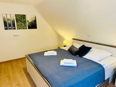 Ein Bett oder Betten in einem Zimmer der Unterkunft Haus Brockenblick #Garten #ruhige Lage #PS 5 #Netflix von Harztraveler