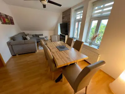 Ein Sitzbereich in der Unterkunft FeWo Schlossblick #Innenstadt #Garten #Netflix von Harztraveler