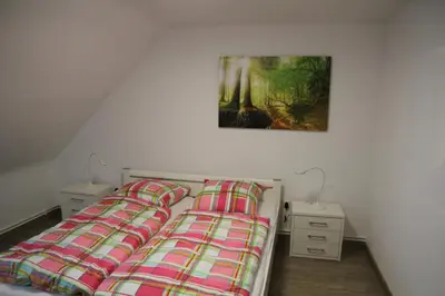 Ein Bett oder Betten in einem Zimmer der Unterkunft Wohnung Julius 4
