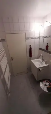Ein Badezimmer in der Unterkunft Ferienwohnung Kück-Theodor-Hein-Str.