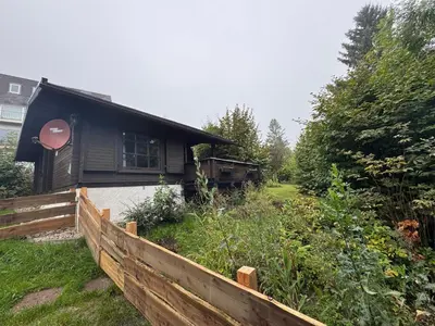 Ein Garten an der Unterkunft Blockhaus - Die Zwergenbaude -