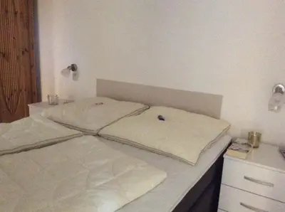 Ein Bett oder Betten in einem Zimmer der Unterkunft Fewo Romy - a60954