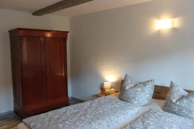 Ein Bett oder Betten in einem Zimmer der Unterkunft Apartments Ackerbürgerhof No. 9