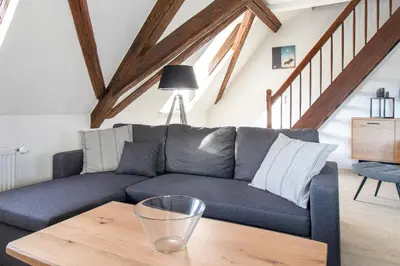 Ein Sitzbereich in der Unterkunft Ferienwohnungen im Weingarten Quedlinburg
