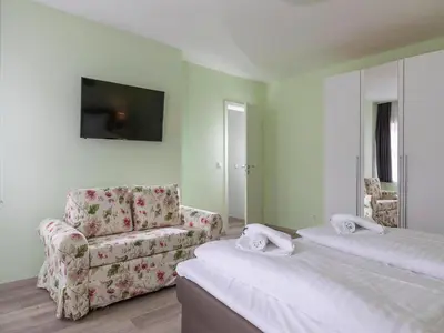 Ein Bett oder Betten in einem Zimmer der Unterkunft Ferienwohnung Schlossblick, Wernigerode