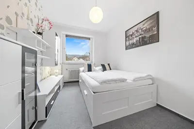 Ein Bett oder Betten in einem Zimmer der Unterkunft EUPHORAS - Gemütliches Apartment in Bad Harzburg - 73 qm - 3 Zimmer
