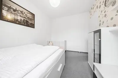 Ein Bett oder Betten in einem Zimmer der Unterkunft EUPHORAS - Gemütliches Apartment in Bad Harzburg - 73 qm - 3 Zimmer