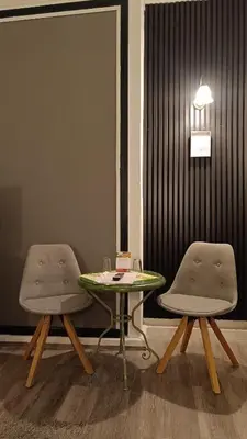 Ein Sitzbereich in der Unterkunft Hotel Villa Alice