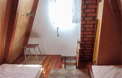 Ein Bett oder Betten in einem Zimmer der Unterkunft Ferienhaus Auf Den Thie I