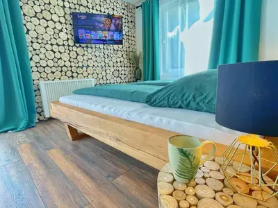 Ein Bett oder Betten in einem Zimmer der Unterkunft FeWo 