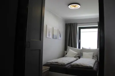 Ein Bett oder Betten in einem Zimmer der Unterkunft Harzbutze 60